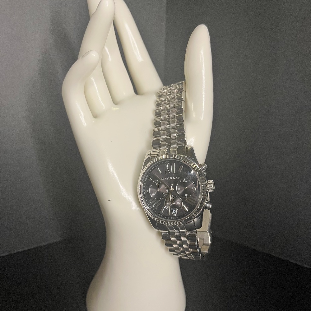 Silver MK men’s watch